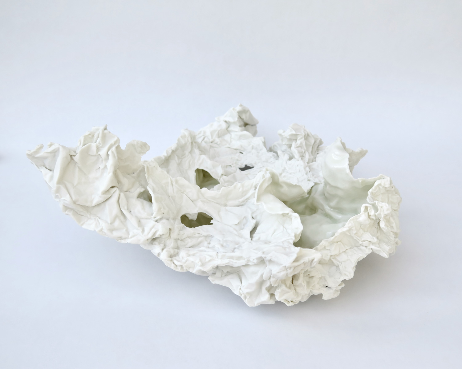"Songe d'étendues", 2023. Porcelaine, impression par coulage. H. 15 x L. 21 x P. 15 cm